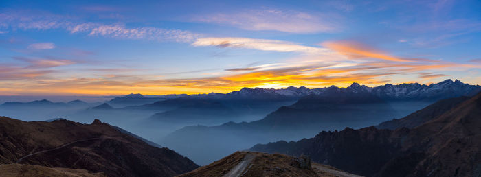 Scenic view of mountains at sunset