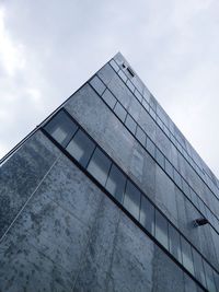 Low angle view of building against sky in city