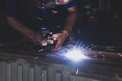 Welder, welding automotive part in a car factory