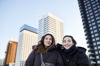 Portrait of young women in modern neighborhood