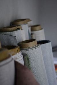 Rolls of fabric against the wall