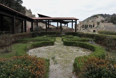 Built structure in garden against sky