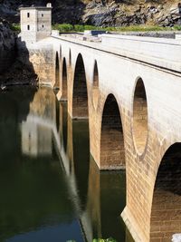 Arch bridge over river