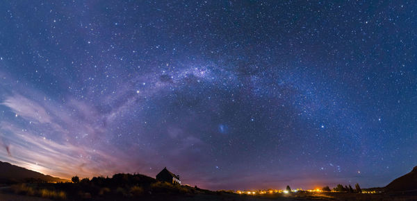 Scenic view of star field against sky at night