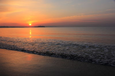 Scenic view of sea against sky during sunset