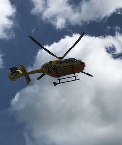 Low angle view of airplane against sky