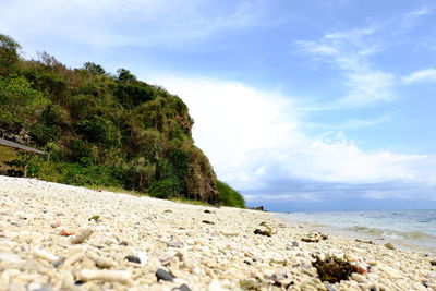 Scenic view of beach against sky