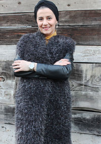 Portrait of a smiling young woman in winter