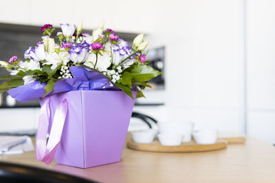 Close-up of flower vase on table