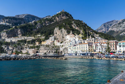 View of buildings in city at waterfront