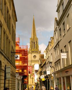 Low angle view of buildings against sky in city