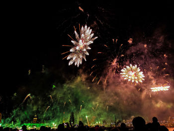 Firework display at night