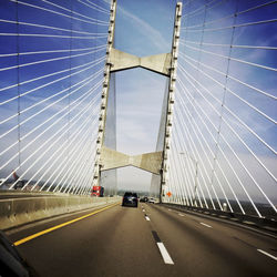 Cars moving on suspension bridge