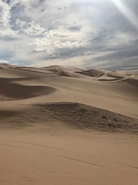 Scenic view of desert against sky