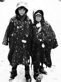 Portrait of a girl standing in snow