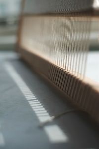 Close-up of piano keys on table