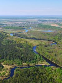 High angle view of river on landscape against sky