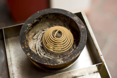 High angle view of swirl incense stick