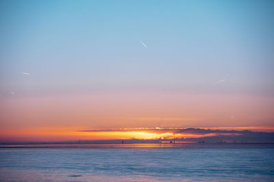 Scenic view of sea against sky during sunset