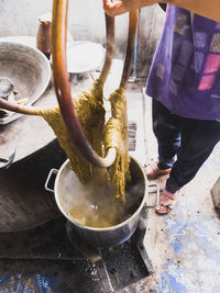 Low section of person preparing food