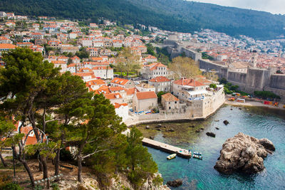 Dubrovnik west pier and medieval fortifications of the city seen from fort lovrijenac