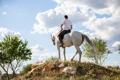 Man riding horse