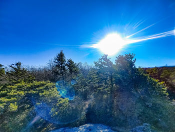 Scenic view of bright sun on sunny day