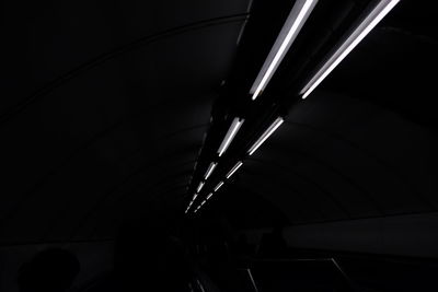 Low angle view of illuminated lights at night