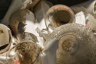 High angle view of shells in container on table