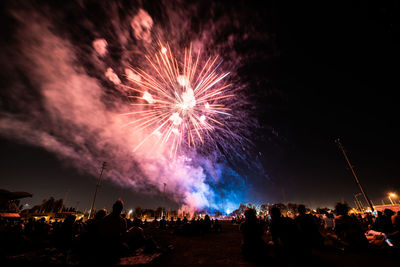 Firework display at night