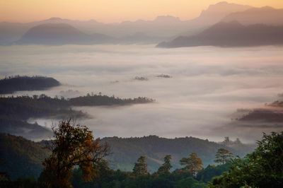 Scenic view of mountains against sky during sunset