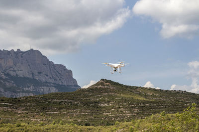 Airplane flying over landscape