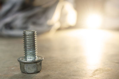 Close-up of coins on table