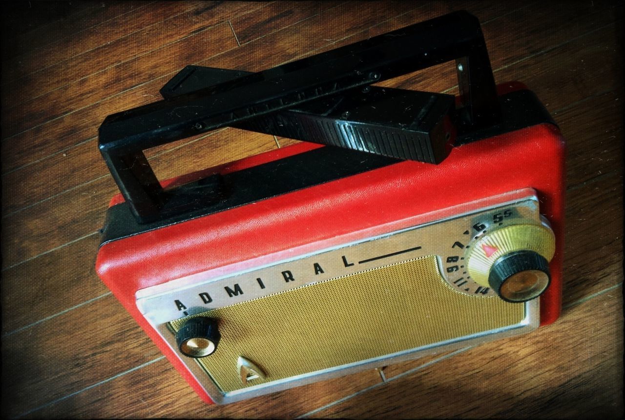 CLOSE-UP OF GUITAR ON TABLE