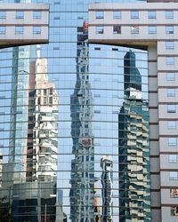 Full frame shot of modern building with reflection