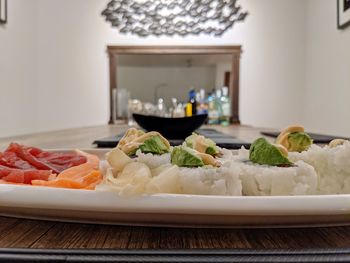 Close-up of food served on table at home