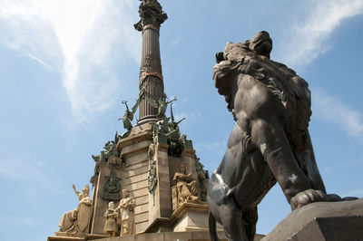 Low angle view of statue against sky