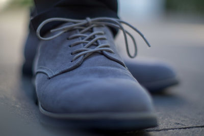 Close-up of shoes with ties