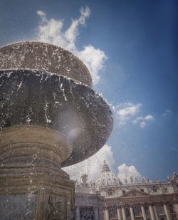 Low angle view of building against blue sky