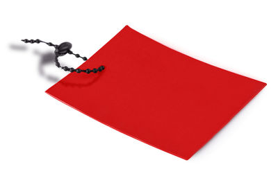 High angle view of paper flag against white background