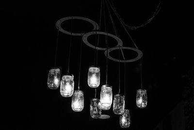 Low angle view of pendant lights hanging from ceiling