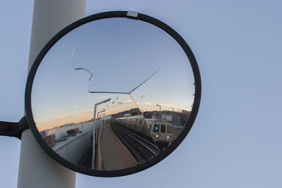 Reflection of broken mirror at subway station