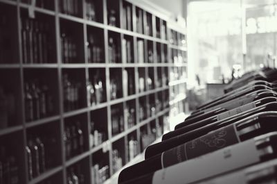 Wine bottles stacked in shelves