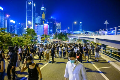 People on street at night