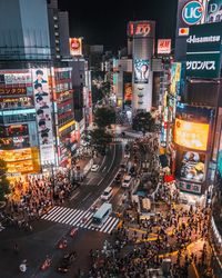 High angle view of illuminated city street at night