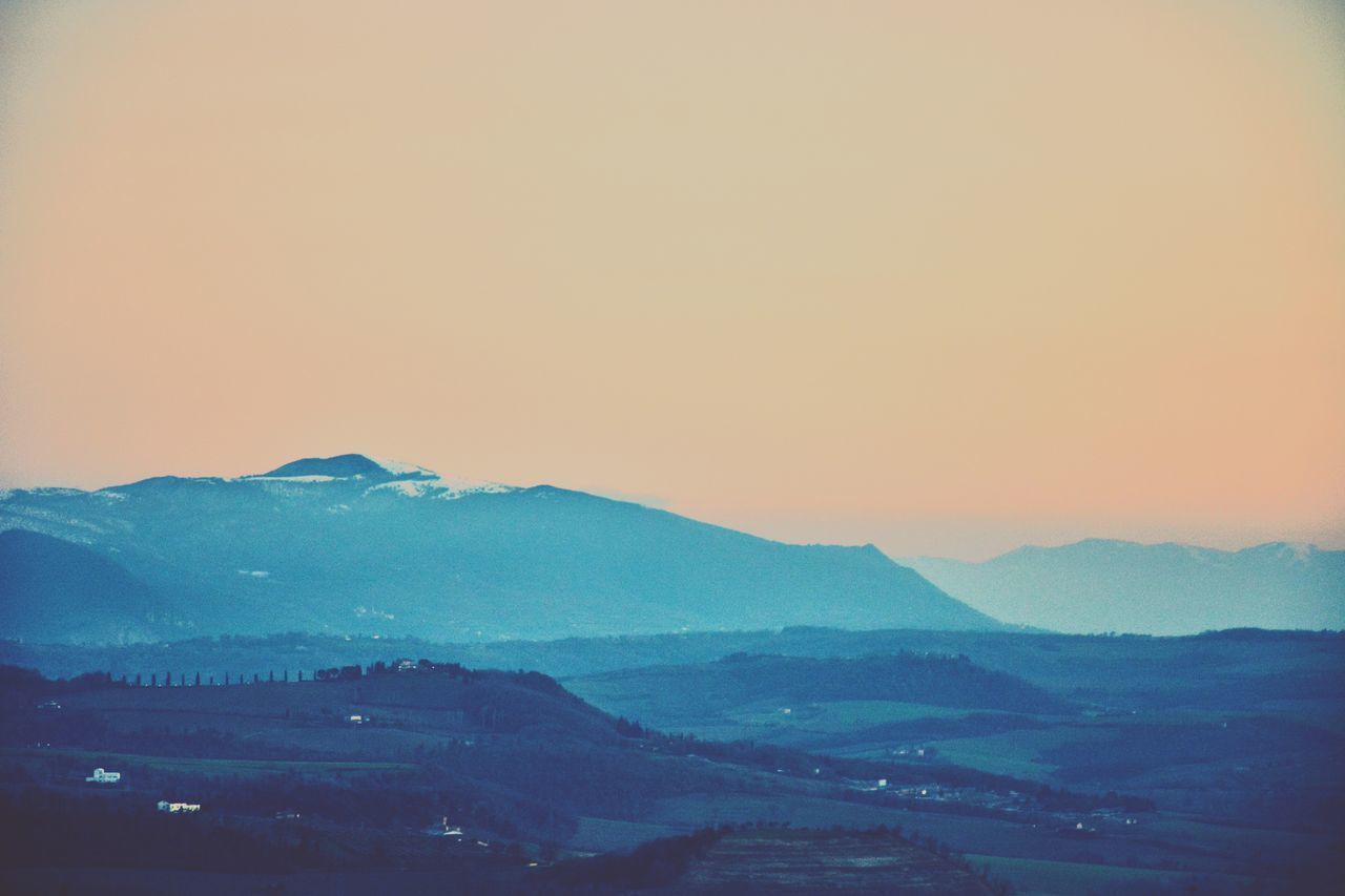 SCENIC VIEW OF MOUNTAIN RANGE AGAINST CLEAR SKY