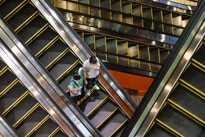 High angle view of people on escalator