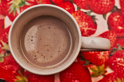 High angle view of coffee cup on table