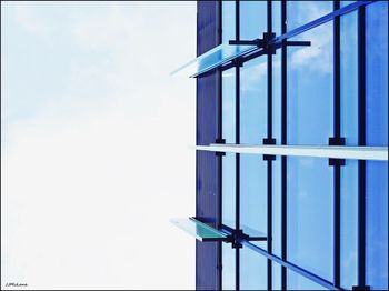 Low angle view of built structure against blue sky