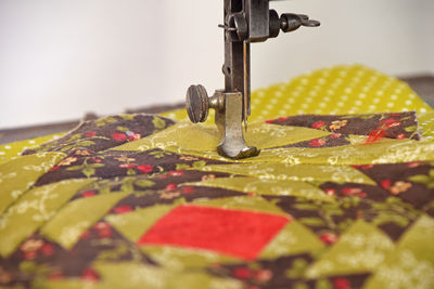 Close-up of quilt on sewing machine